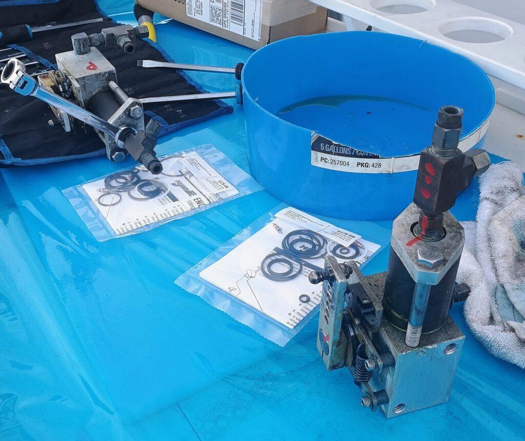 Before photo showing worn and leaking Hynautic hydraulic shifter slave unit requiring rebuild by 805 Marine Mechanic