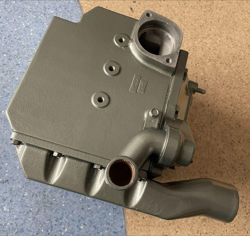 Yanmar marine diesel aftercooler intercooler assembly showing charge air cooling system serviced by trained technician at 805 Marine Diesel Mechanic