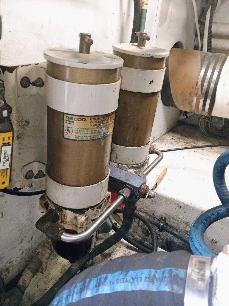 Racor marine diesel fuel filters showing contaminated fuel and water separation during Caterpillar fuel system diagnosis by 805 Marine Diesel Mechanic Ventura Channel Islands Harbor