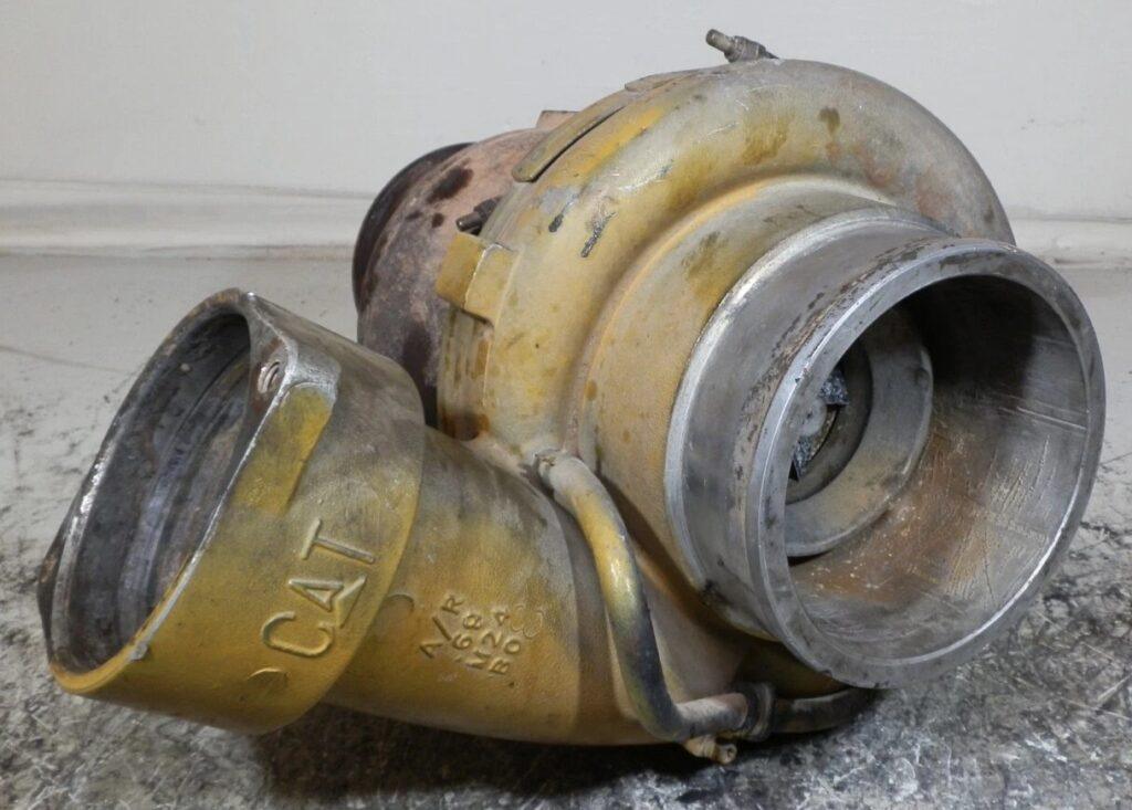 Caterpillar marine diesel turbocharger removed for inspection during turbo system diagnosis by 805 Marine Diesel Mechanic Ventura Channel Islands Harbor