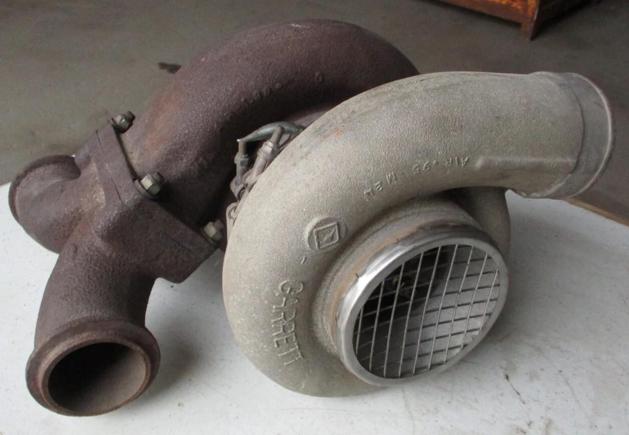 Detroit Diesel 8V92 marine turbocharger close-up showing compressor and turbine housing used for diagnosing low boost and power loss