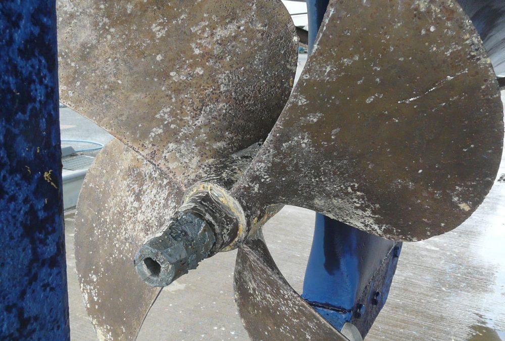 Marine propeller with damage and marine growth causing boat not reaching full RPM diagnosed by trained technician at 805 Marine Diesel Mechanic Ventura Channel Islands Harbor