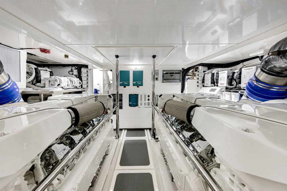 High performance marine diesel engine room with twin MAN V12 engines during no-start diagnostic inspection by trained technician at 805 Marine Diesel Mechanic Ventura Channel Islands Harbor